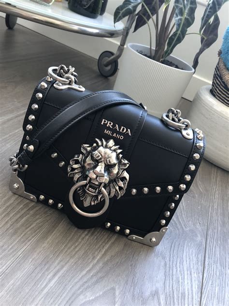 prada cahier lion head bag silver|prada handbags.